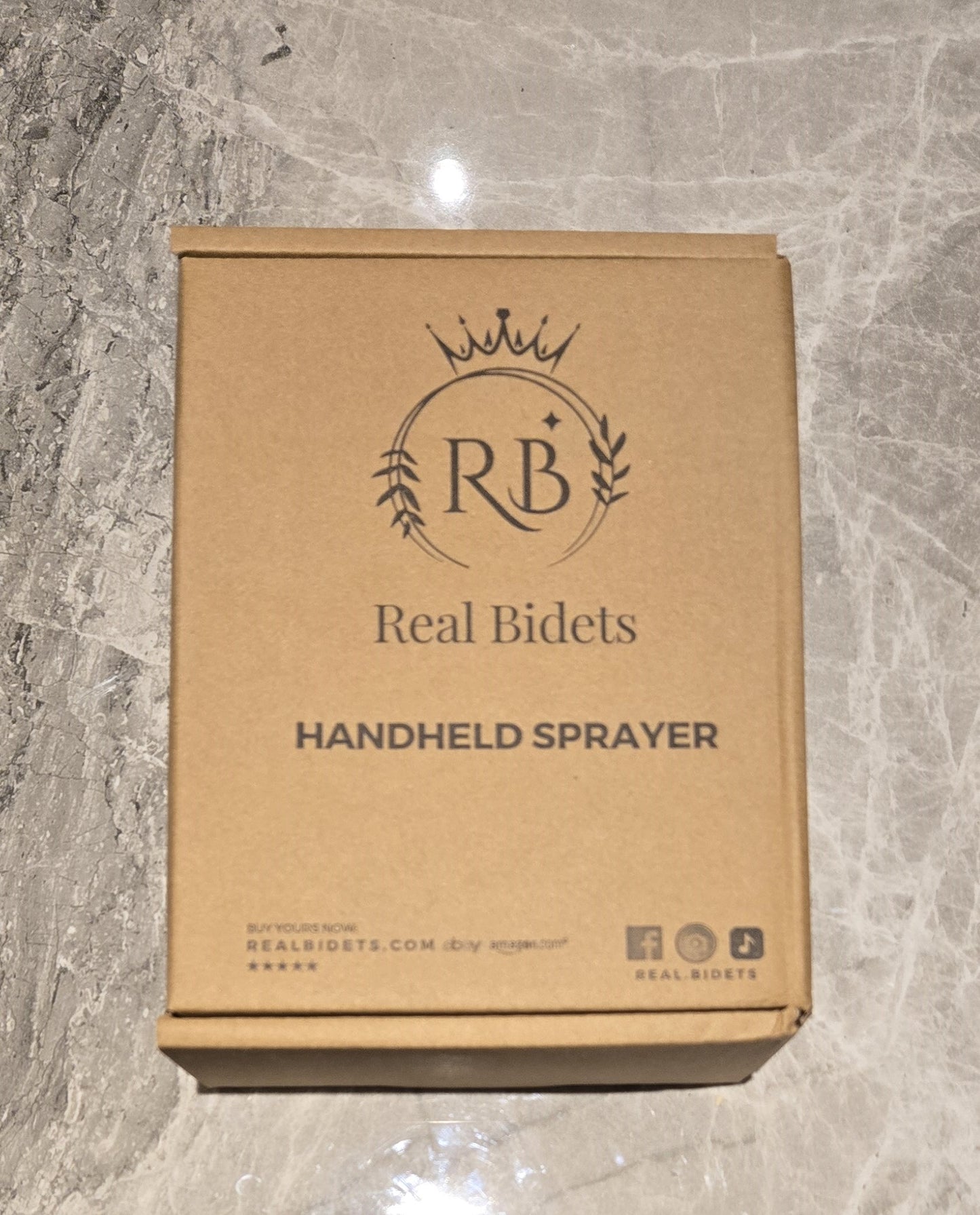 Real Bidets kraft box packaging for handheld bidet kit