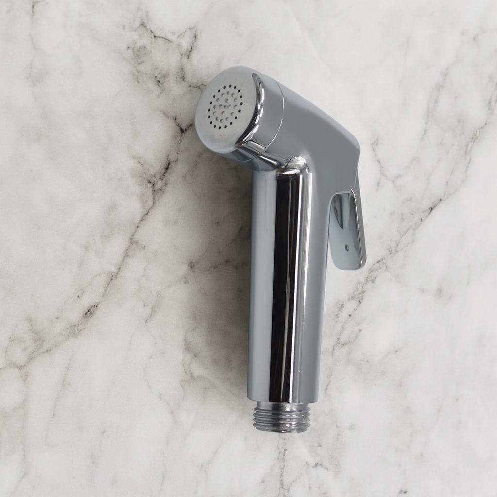 Front view of Real Bidets handheld sprayer on marble background
