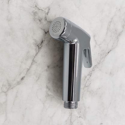 Front view of Real Bidets handheld sprayer on marble background